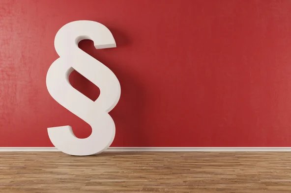 Rotes Bild mit weißen Paragraphen